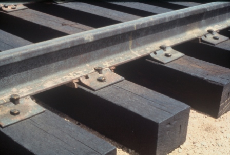 What are railroad ties treated with